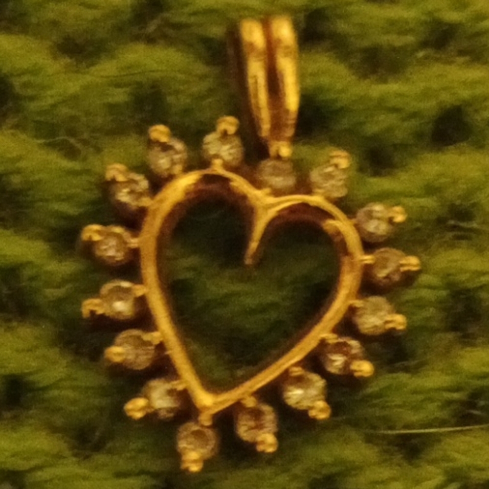 10 Karat Gold And Diamond Heart Shaped Pendant